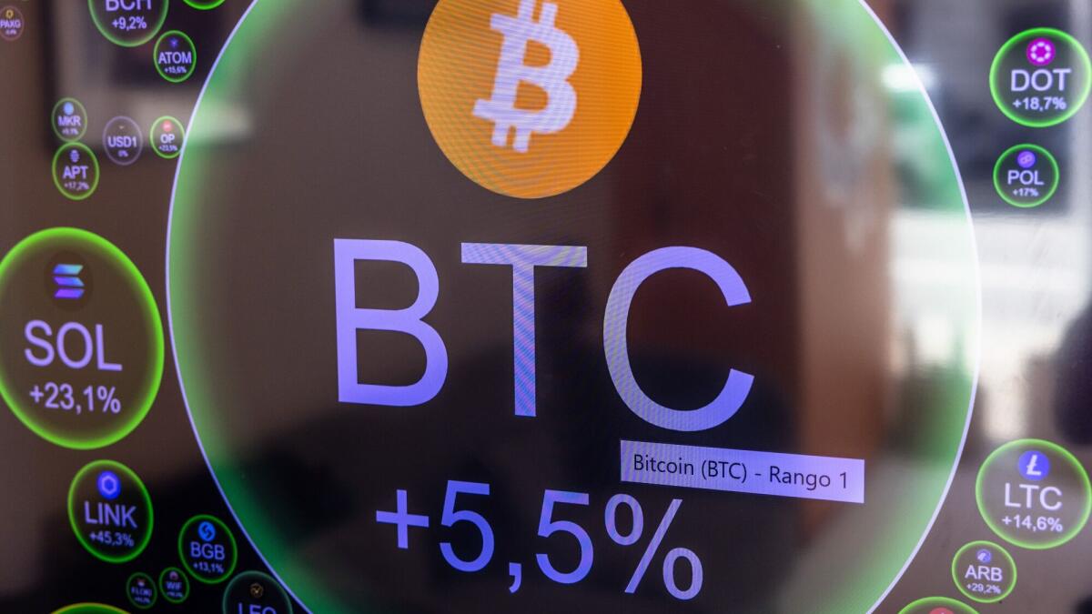 Bitcoin retreats from record after markets get inflation jolt - Los Angeles  Times