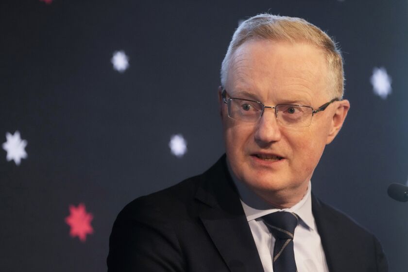FILE - Governor of the Reserve Bank of Australia Philip Lowe speaks in Sydney, Australia, Thursday, Sept. 8, 2022. Australia's central bank has boosted its benchmark interest rate for a sixth consecutive month to a nine-year high of 2.6% Tuesday Oct. 4, 2022. (AP Photo/Mark Baker, File)