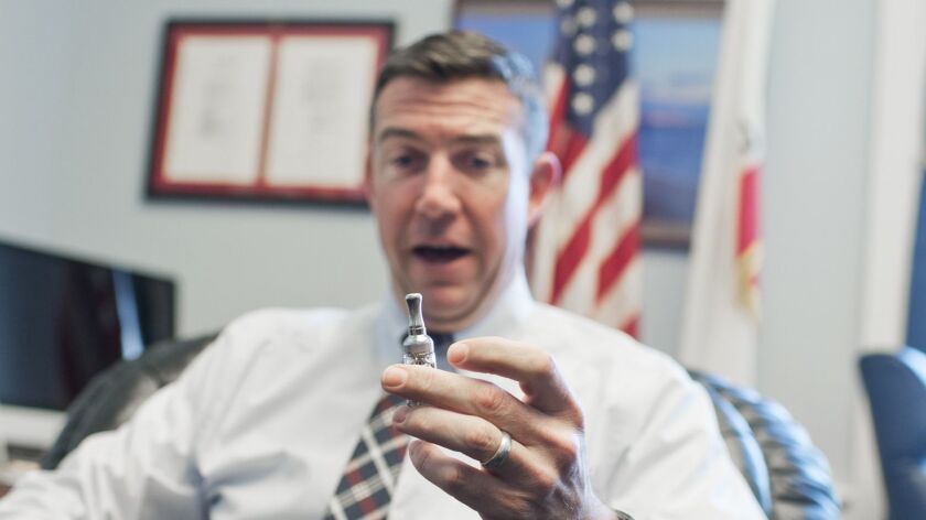 UNITED STATES - JANUARY 13: Rep. Duncan Hunter, R-Calif., is interviewed about his vaporizer pen in his Rayburn office.