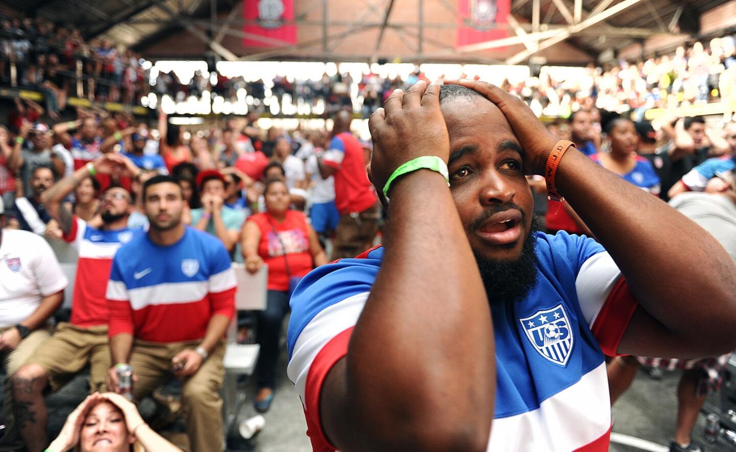 At a World Cup viewing party at a warehouse in downtown Los Angeles, fans can't bear to look after the U.S. gave up the tying goal against Portugal. There was also a second viewing party at Lot 613 in the Arts District. The game ended in a 2-2 tie.
