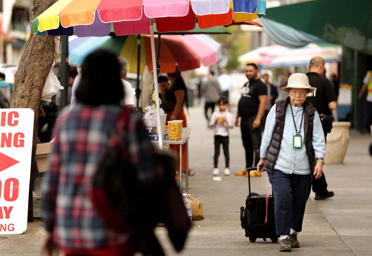A senior woman in L.A.'s Chinatown