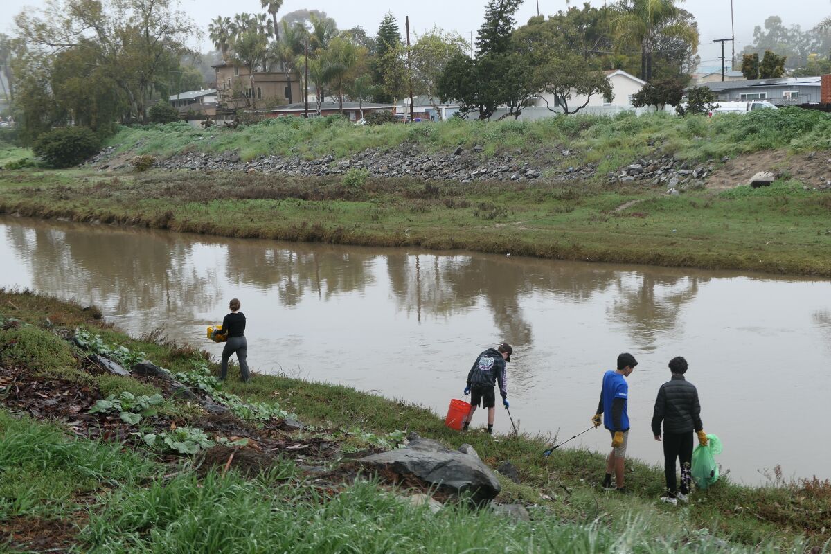 Friends of Rose Creek volunteers doing a cleanup on March 11.