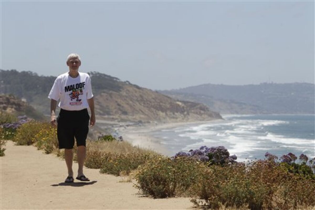 This May 26, 2011 photo shows former Michigan and Arizona State basketball coach Bill Frieder walks a path only a few yards from home along the Pacific Ocean, in Del Mar, Calif. Frieder helped the Sacramento Kings' owners launch the richest contest in skateboarding in 2008. The Maloof Money Cup opens its most ambitious season yet this weekend in New York. (AP Photo/Lenny Ignelzi)
