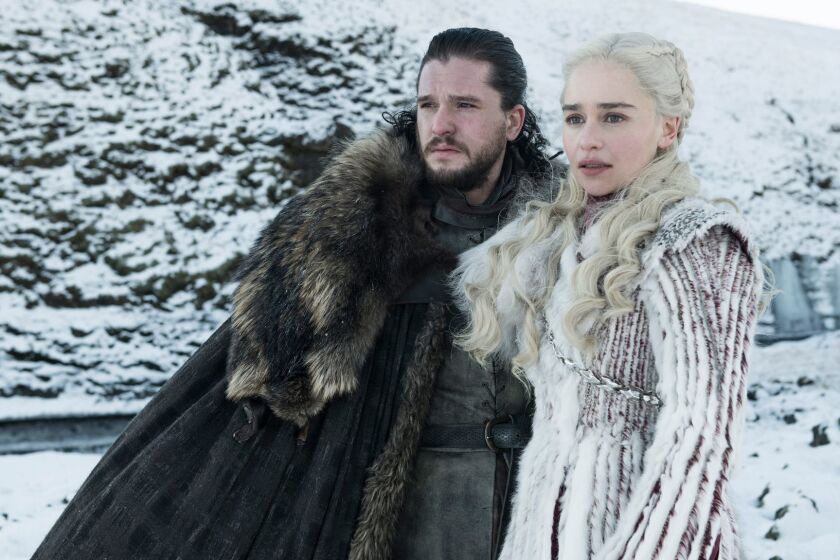 This photo released by HBO shows Kit Harington as Jon Snow, left, and Emilia Clarke as Daenerys Targaryen in a scene from "Game of Thrones," which premiered its eighth season on Sunday. (HBO via AP)