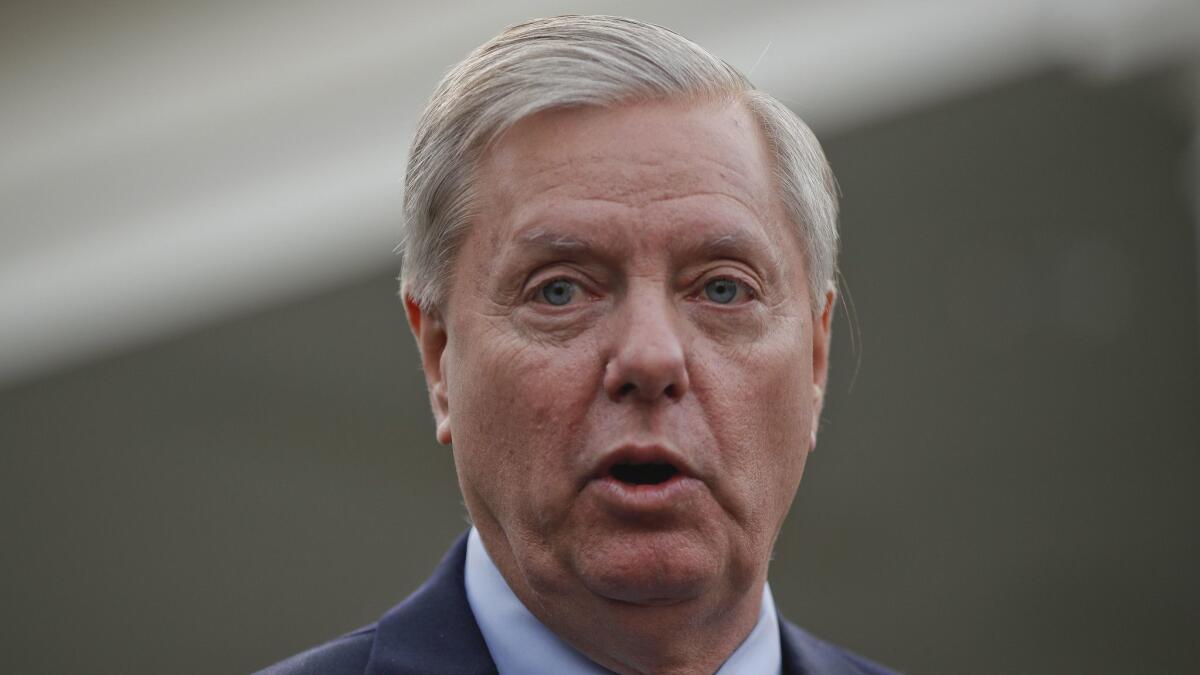 Sen. Lindsey Graham (R-S.C.) speaks to the media outside the West Wing of the White House after meeting with President Trump.