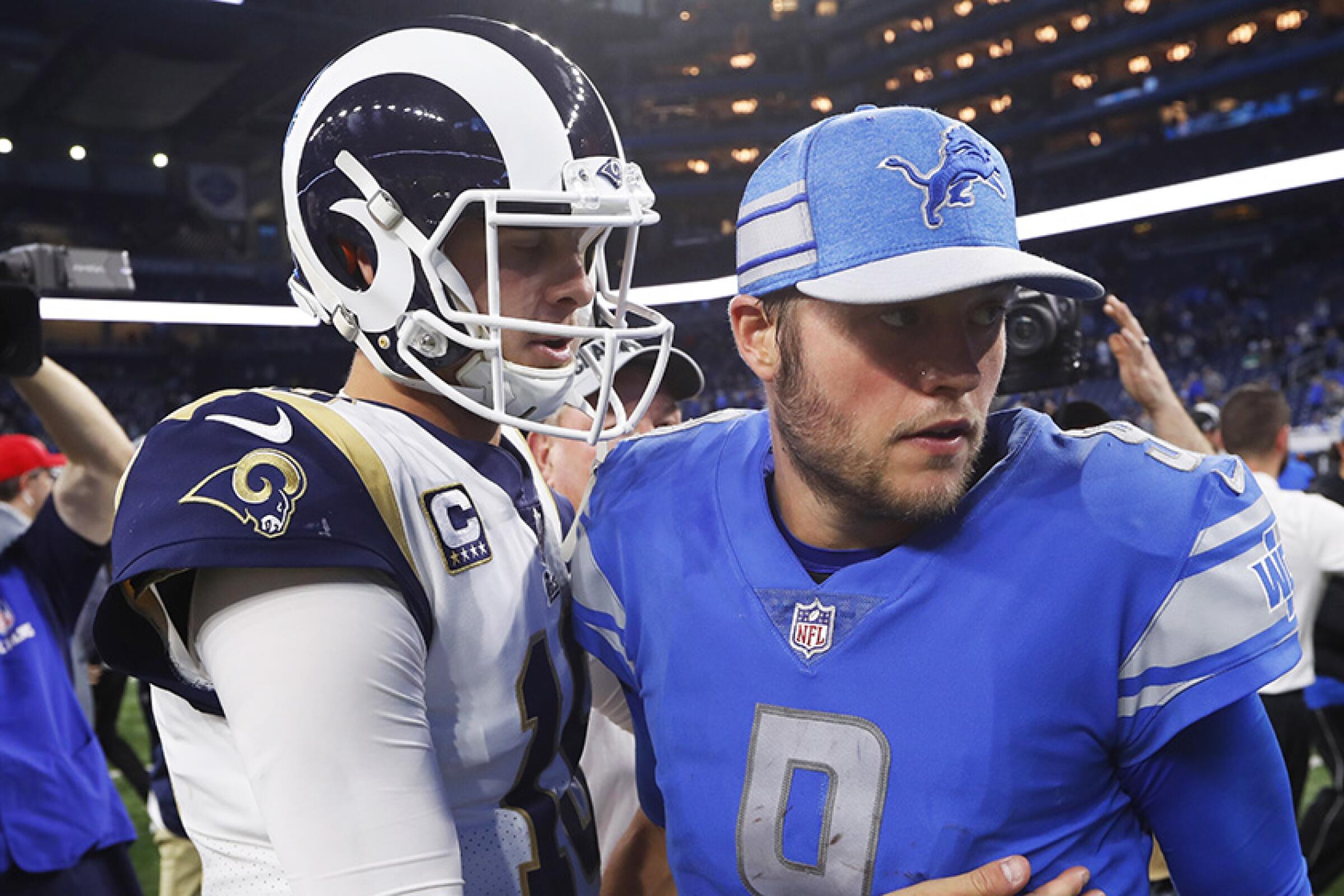 Quarterbacks Jared Goff and Matthew Stafford greet each other after a game in 2018.