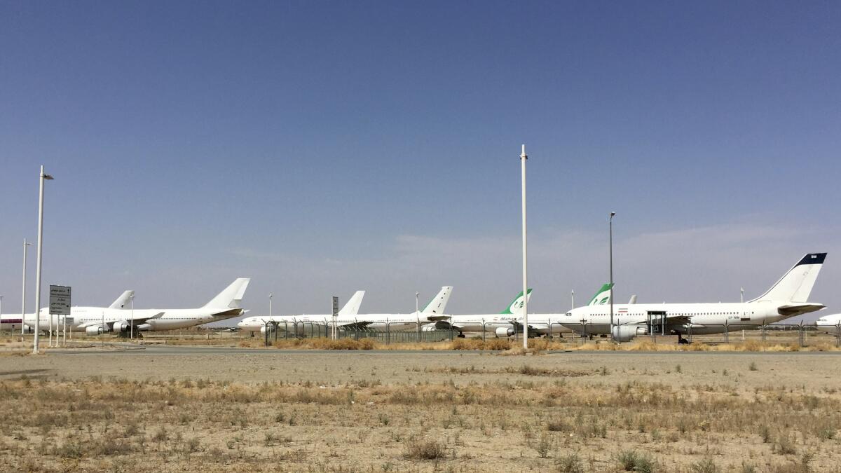 Airplanes are mothballed at the international airport in Tehran.