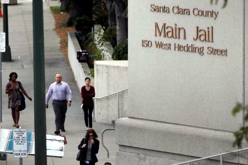 FILE - This Sept. 2, 2016 file photo shows the Santa Clara County Jail in San Jose, Calif. The county has agreed to pay $3.6 million to the family of a mentally ill inmate who was beaten to death at the jail last year. The family of Michael Tyree reached the settlement after filing a wrongful death and civil rights violation claim. Three jail guards have been charged with murder in connection with the death. (Karl Mondon /San Jose Mercury News via AP, File)