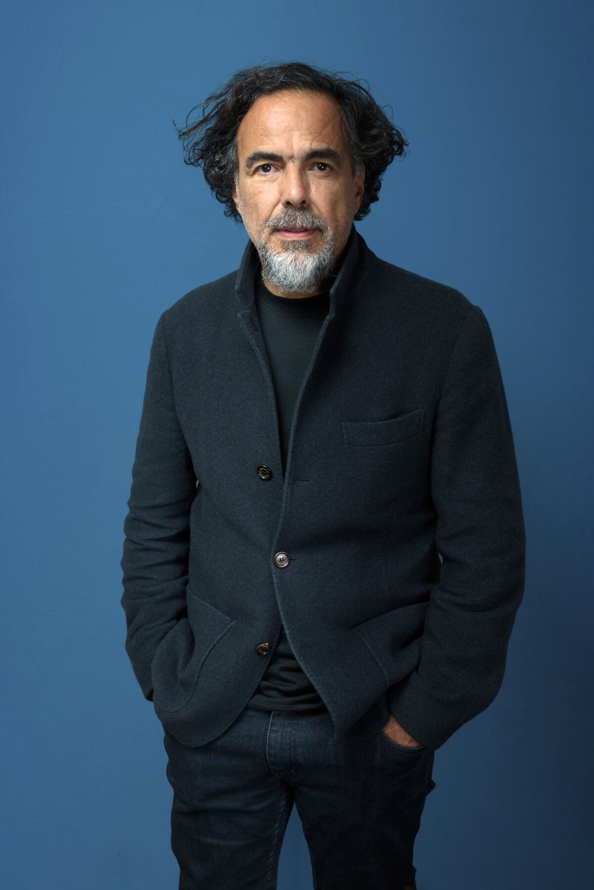 Alejandro Gonzalez Inarritu stands for a portrait