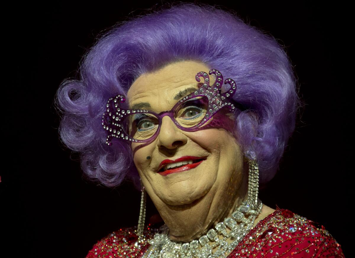 Australian TV presenter Barry Humphries performs as Dame Edna at the London Palladium theatre in London on Nov. 13, 2013. 