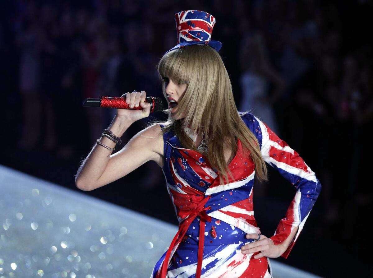 Taylor Swift performs during the Victoria's Secret Fashion Show in New York on Nov. 13, 2013.