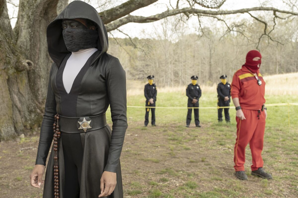 This image released by HBO shows Regina King in a scene from "Watchmen." The series is nominated for 26 Emmy Awards including one for outstanding limited series. (Mark Hill/HBO via AP)