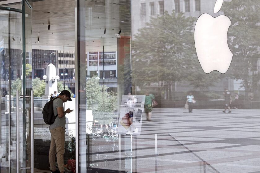 FILE - This Wednesday, July 24, 2019 photo shows an Apple Store in Chicago is seen. Apple reports financial earnings on Thursday, Feb. 2, 2023. (AP Photo/Amr Alfiky, File)