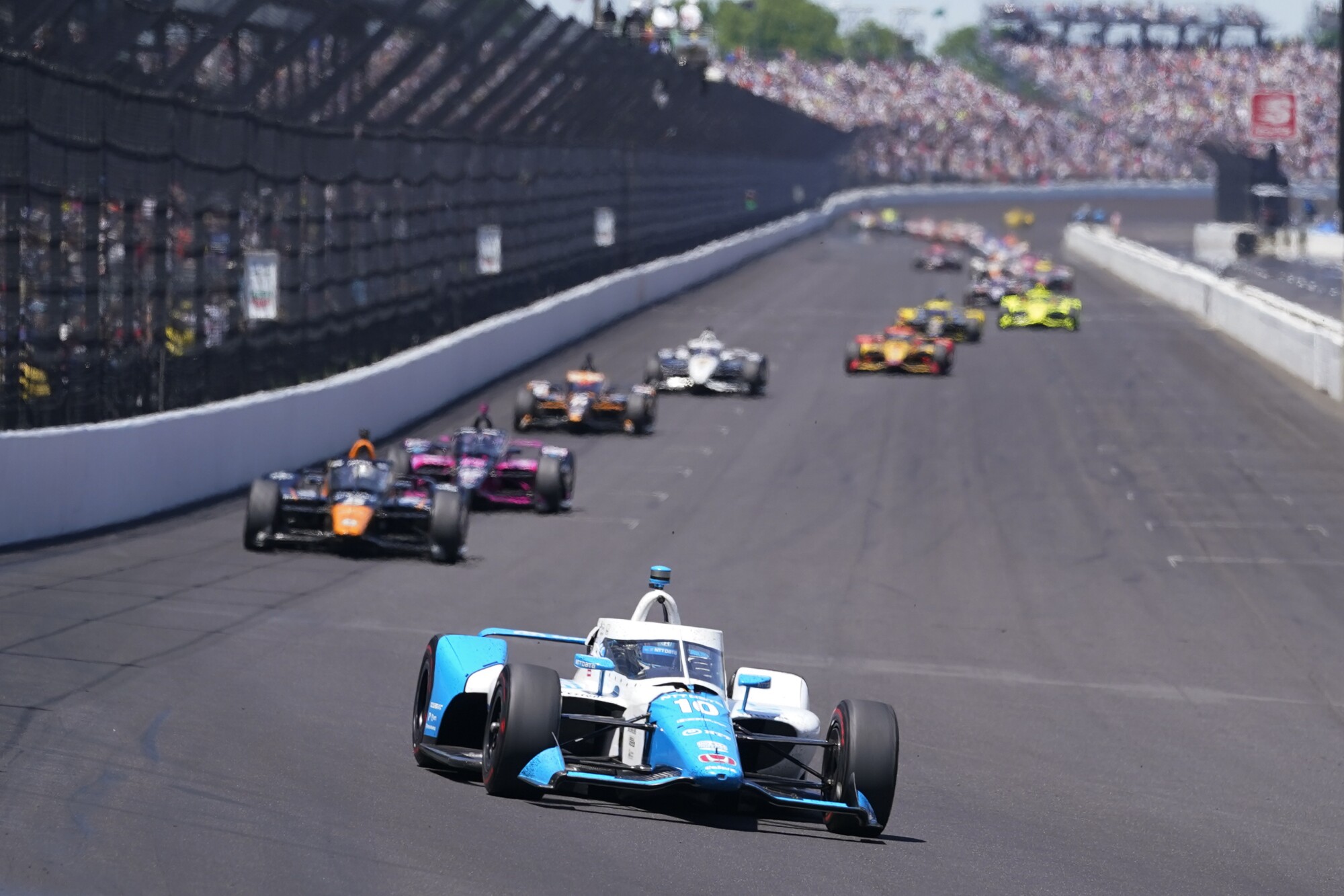 Alex Palou navigates into Turn 1 during Indianapolis 500 2021.