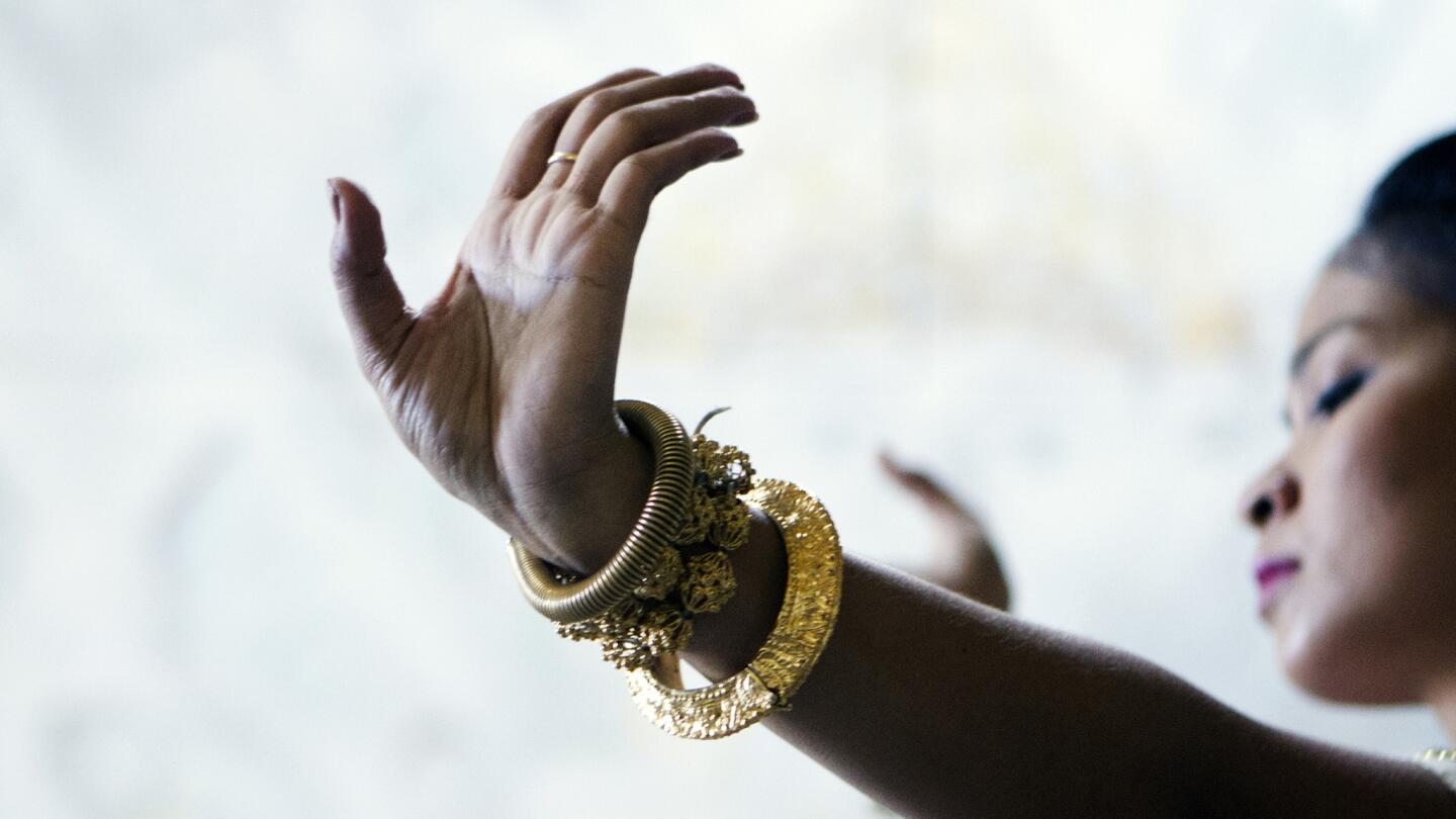 Chamroeuntola Chap of the Royal Ballet of Cambodia rehearses. The ballet will perform at Cal State Long Beach's Carpenter Center on Saturday, Oct. 18.