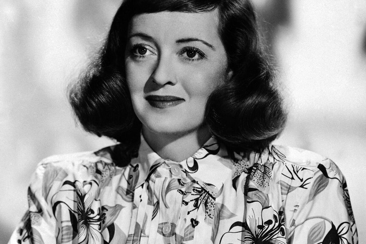 Actress Bette Davis in a black and white portrait