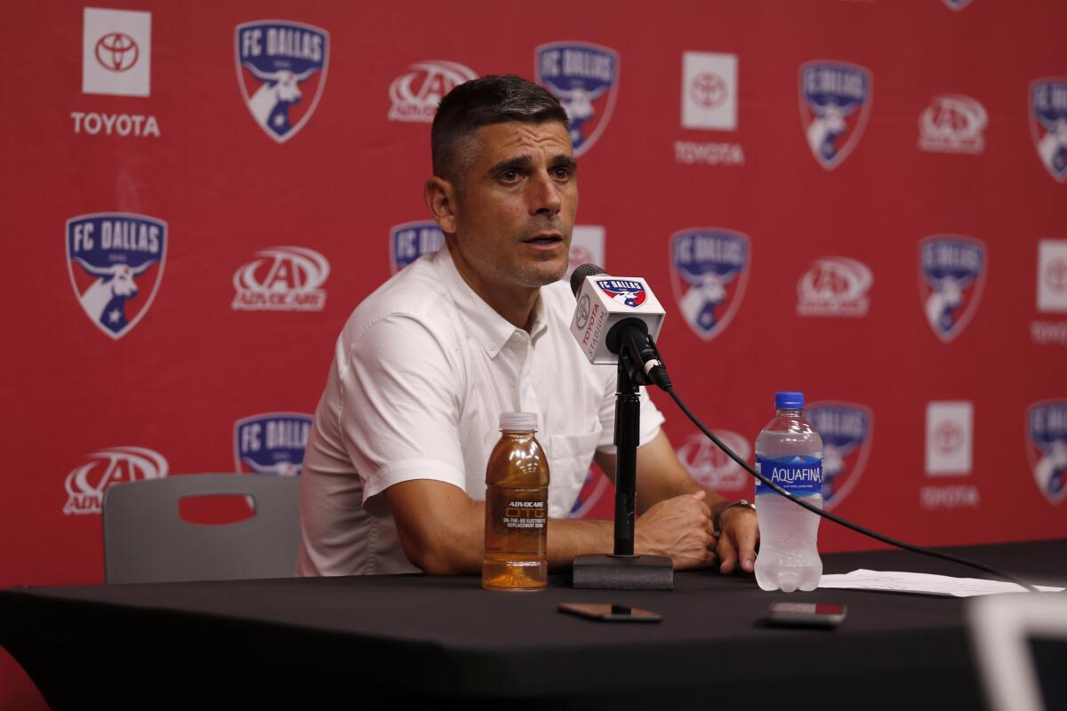 FC Dallas coach Luchi Gonzalez speaks during a news conference.