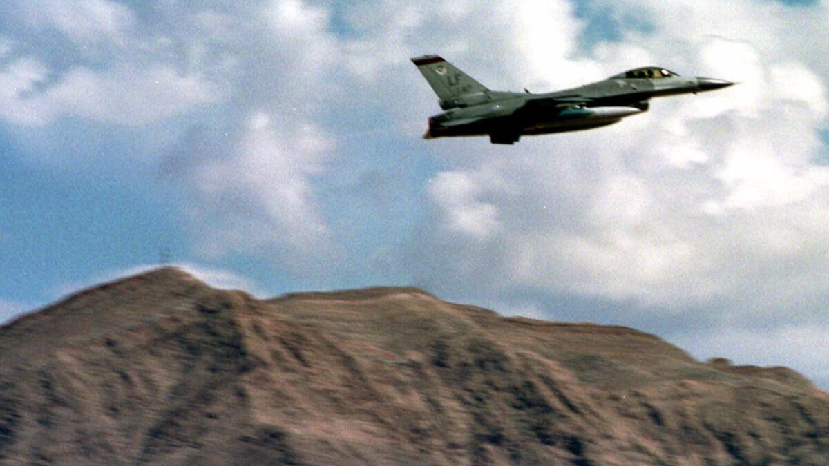 An F-16 fighter jet takes off from Nellis Air Force Base outside Las Vegas in this 1999 photograph.