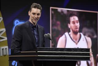 Pau Gasol speaks during his enshrinement at the Basketball Hall of Fame, Saturday.