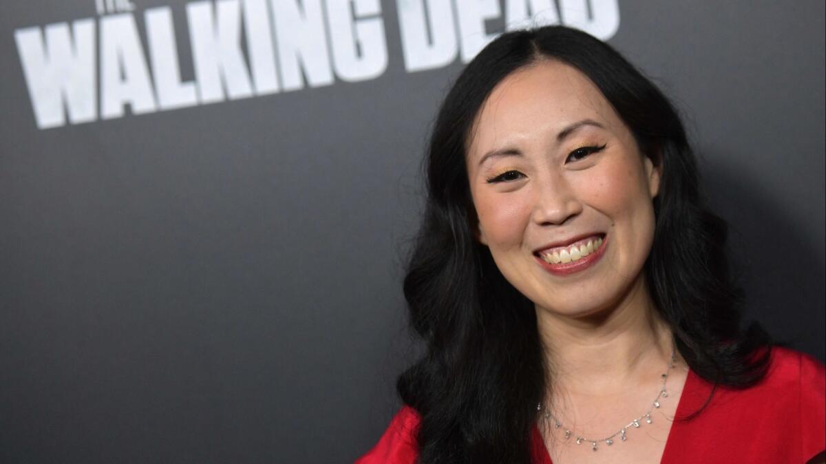 Showrunner Angela Kang attends the premiere of AMC's "The Walking Dead" Season 9 at the DGA theatre in Los Angeles.