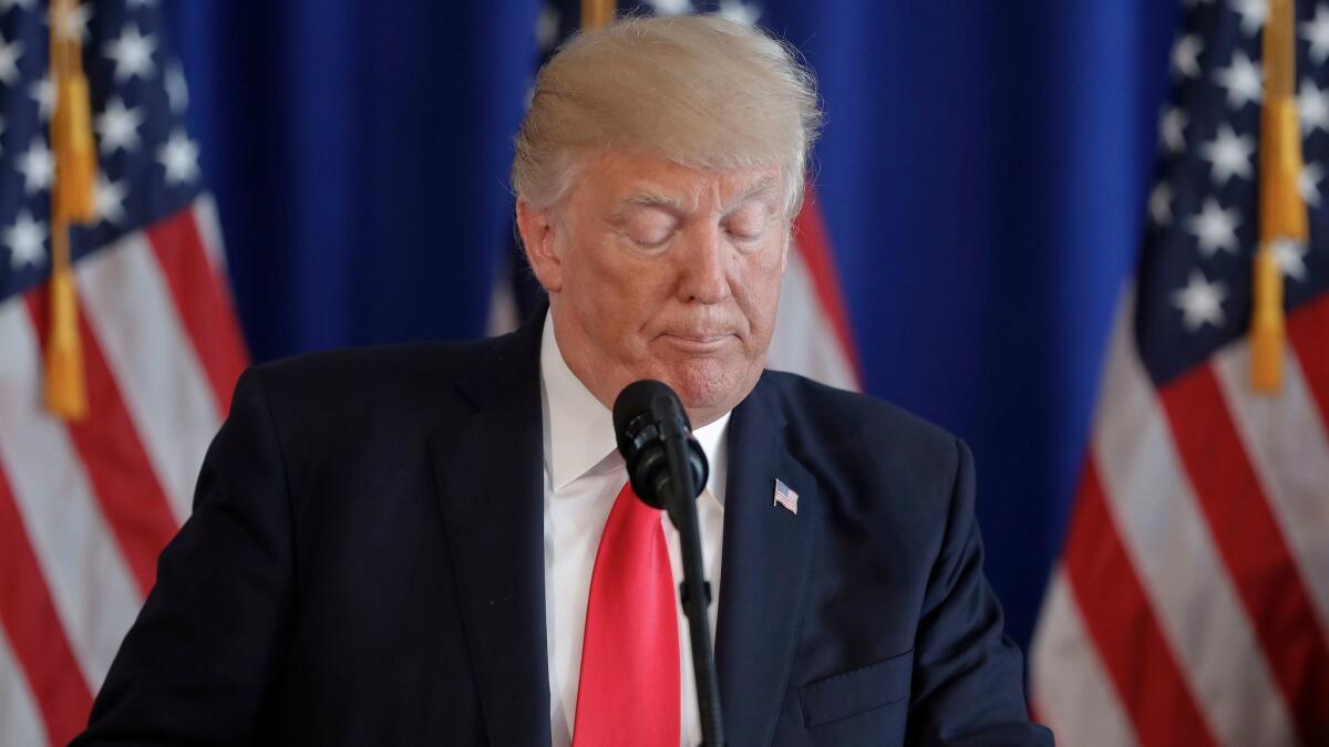 President Trump gives a statement on the violence in Charlottesville, Va., at his golf club in Bedminster, N.J., on Saturday.