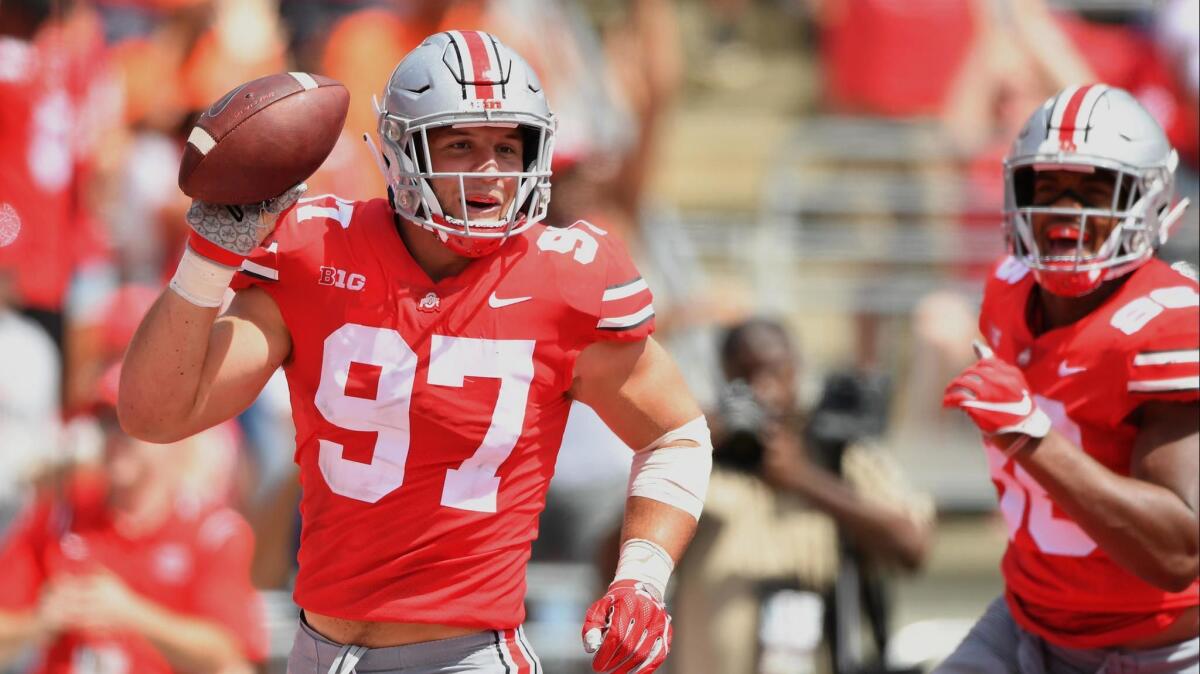 Nick Bosa (97) of the Ohio State Buckeyes celebrates after recovering a fumble in the end zone for a touchdown in the second quarter against the Oregon State Beavers at Ohio Stadium on Sept. 1, 2018 in Columbus, Ohio.