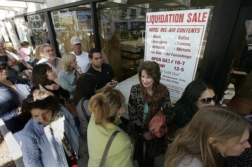 Shoppers wait to get into the Hotel Bel-Air furnishings sale at a former Circuit City store in Santa Monica. The legendary hotel has closed for a two-year renovation.