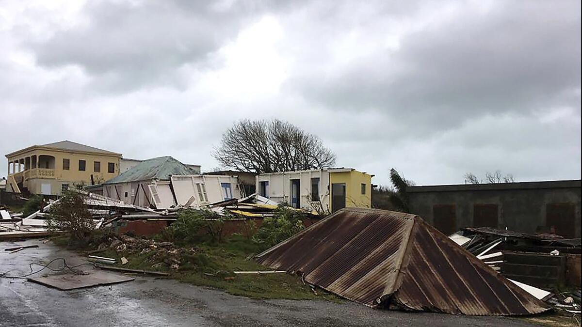 This Sept. 6, 2017, photo shows storm damage in the aftermath of Hurricane Irma on the British island of Anguilla. Some businesses and government agencies on the Caribbean island used the Titan HST app to determine whether employees were safe during and after the storm.