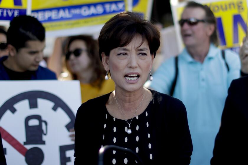 ADVANCE FOR RELEASE SATURDAY, OCT. 6, 2018, AND THEREAFTER - In this Monday, Oct. 1, 2018 photo Young Kim, speaks at a gas tax rally in Fullerton, Calif. Republican Kim will face Democrat Gil Cisneros in the open 39th District in California, in what is expected to be a hotly contested race. (AP Photo/Chris Carlson)