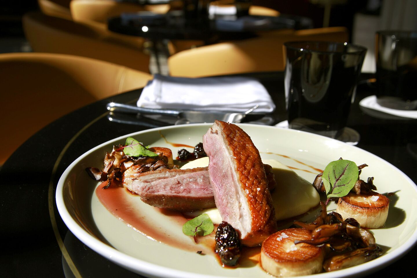 Grilled duck breast with umeboshi, ginger pomme puree and mushrooms is a favorite at Paley.