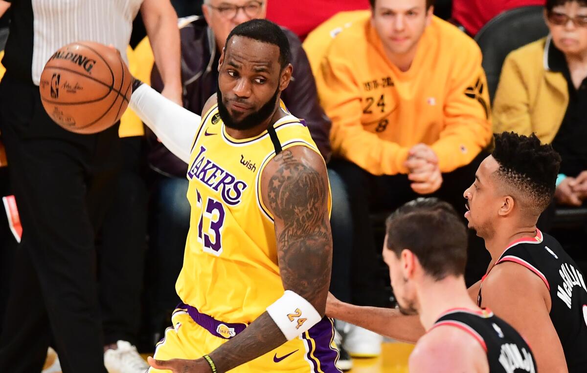 Lakers star LeBron James looks to pass during a loss to the Portland Trail Blazers on Jan. 31.