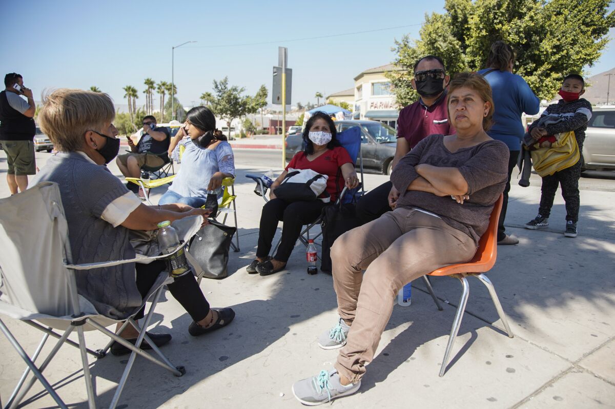 A family waits outside Tijuana hospital