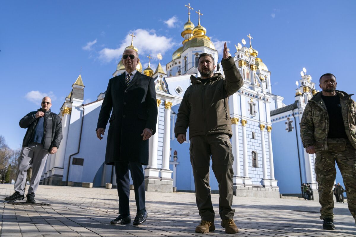 President Biden and Ukrainian President Volodymyr Zelensky outside cathedral