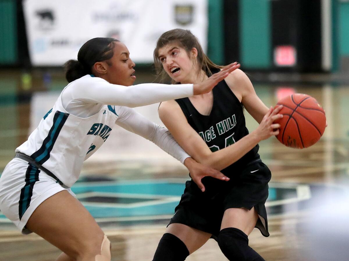 Sage Hill's Isabel Gomez, right, is pressured by Corona Santiago's Makayla Fugate.