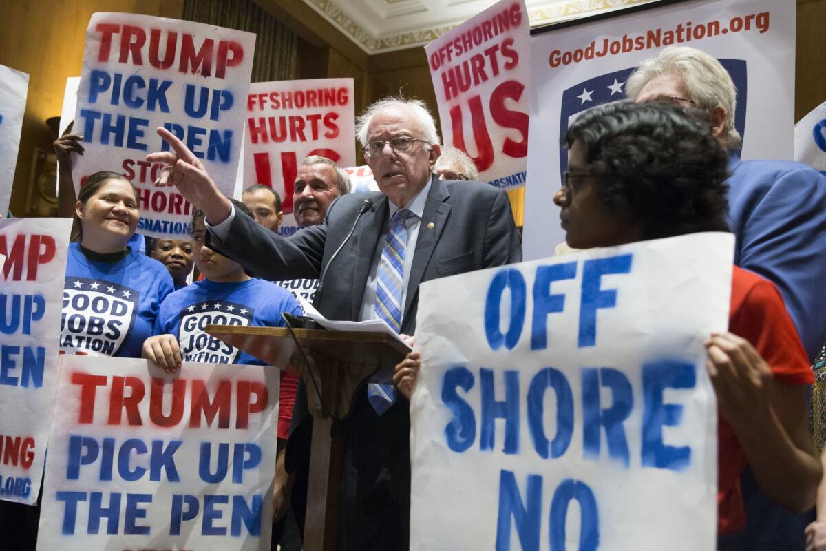 Vermont Sen. Bernie Sanders speaks among supporters at an event calling on President Trump to uphold campaign promises on Capitol Hill in Washington on Sept. 19, 2017.