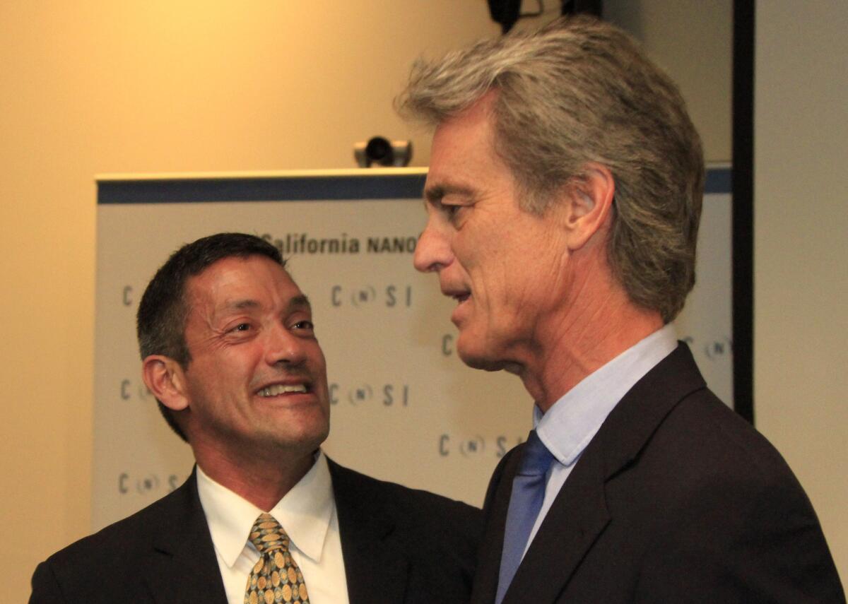 Supervisorial candidate Bobby Shriver, chats with then-rival candidate John Duran after a debate at UCLA in March. Duran finished third in the primary election and on Tuesday threw his support to second-place finisher Shriver instead of Sheila Kuehl.