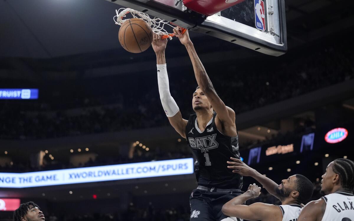 Wembanyama's 33 points, 16 rebounds power the Spurs past Nets 122-115 in  overtime - The San Diego Union-Tribune