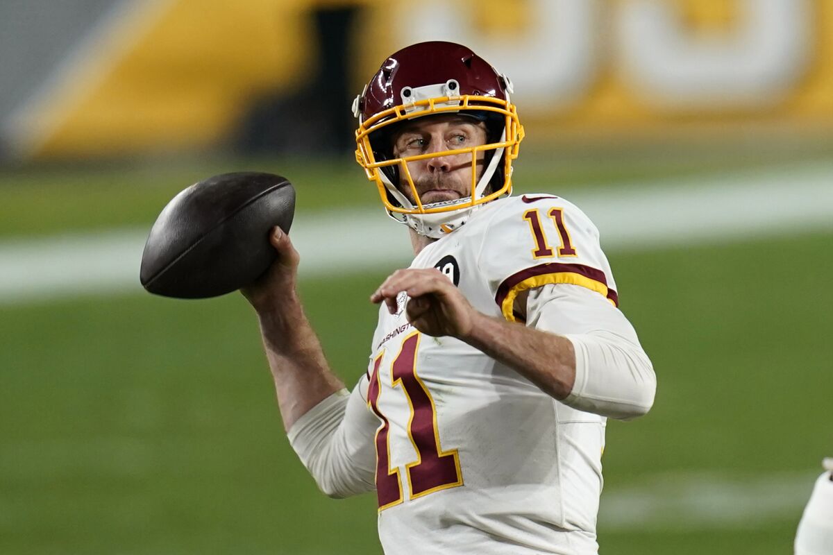 Washington Football Team quarterback Alex Smith (11) throws a 15-yard touchdown pass to Logan Thomas during the second half of an NFL football game against the Pittsburgh Steelers, Monday, Dec. 7, 2020, in Pittsburgh. (AP Photo/Keith Srakocic)
