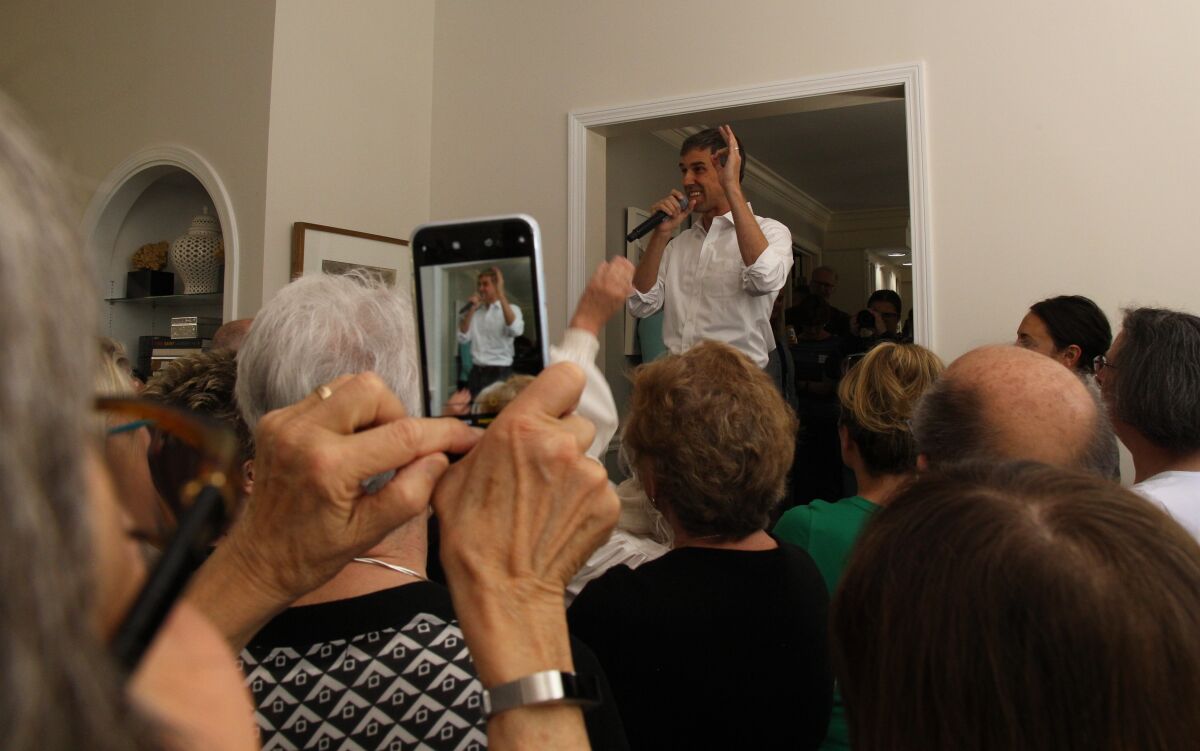 Presidential candidate Beto O'Rourke speaks at a house party in Bedford, N.H.