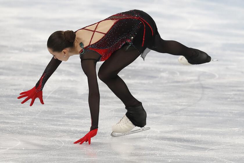 Kamila Valieva from Russia tumbles after a spin in the womenOs single skating-free skating program at Capital Indoor stadium. This at the Beijing 2022 Olympic games.