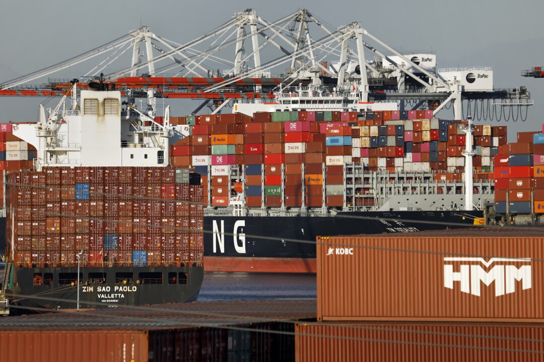 Container ships docked at the Ports of Los Angeles wait to be unload on Wednesday.