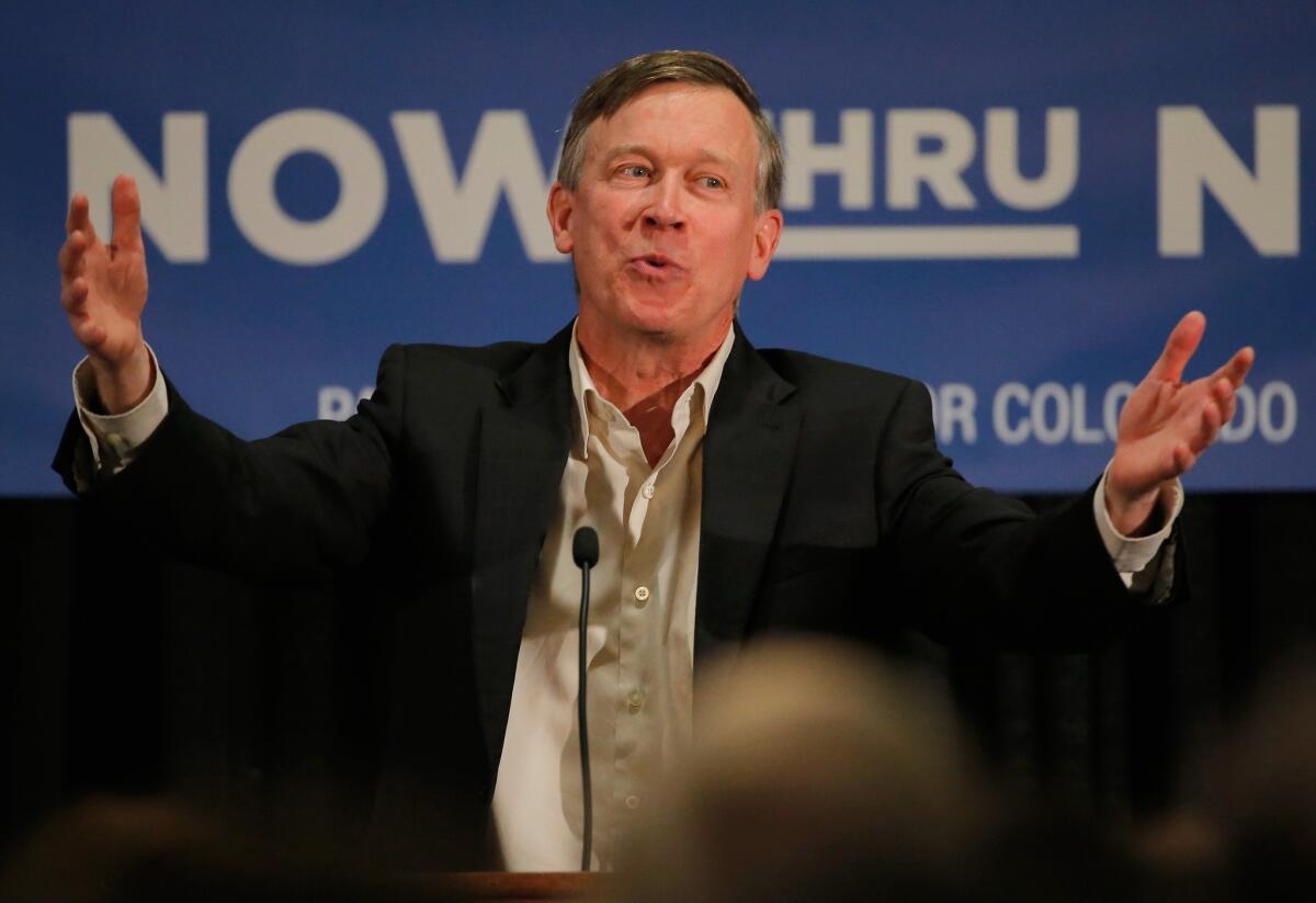Colorado Gov. John Hickenlooper, speaking at an Oct. 21 campaign rally, has been heavily criticized for granting an indefinite reprieve in a death penalty case.
