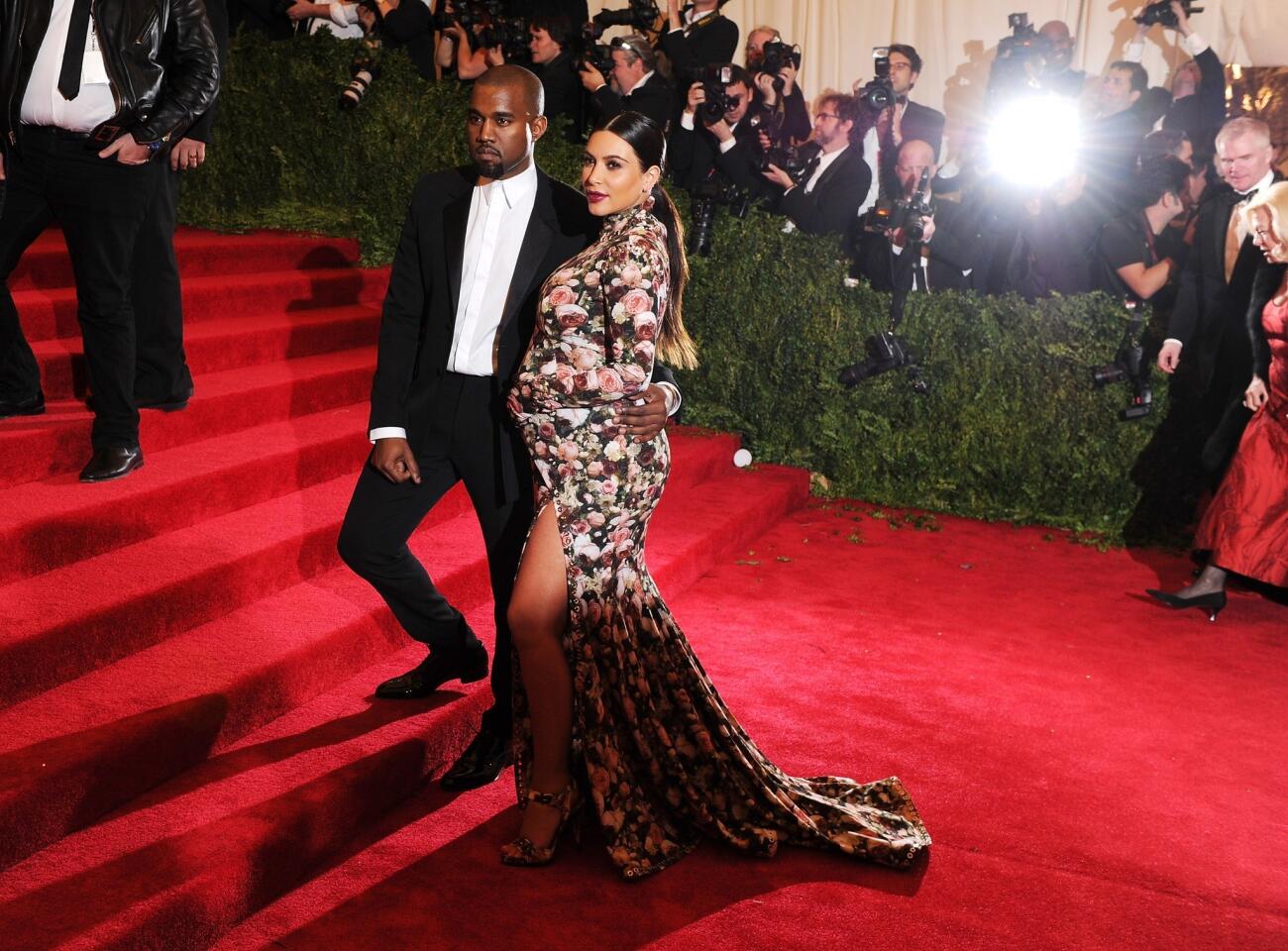 "Yeezus" rapper Kanye West and reality TV star Kim Kardashian attend the Costume Institute Gala for the "PUNK: Chaos to Couture" exhibition at the Metropolitan Museum of Art on May 6, 2013.