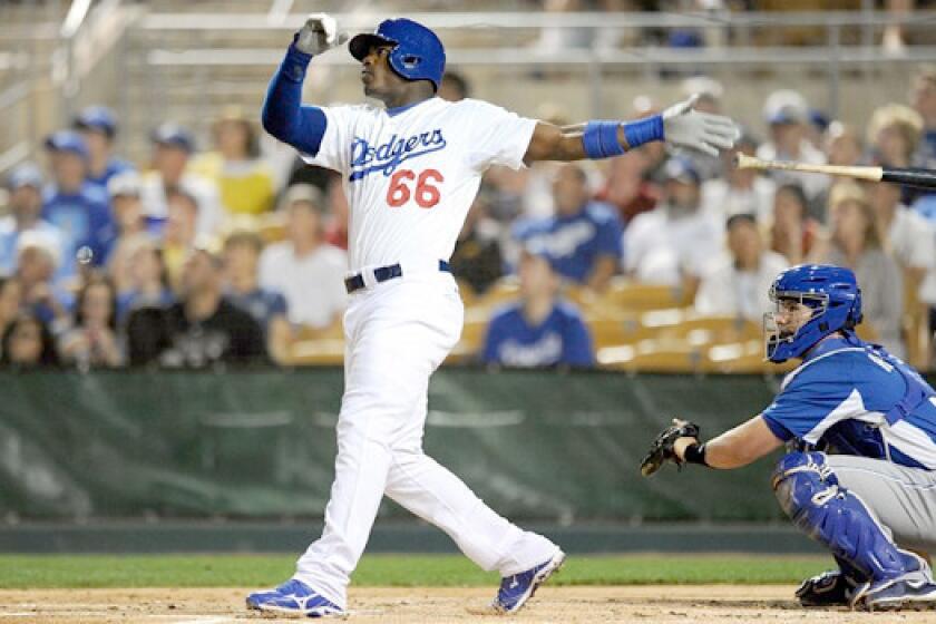 Yasiel Puig went 3 for 3 from the plate with a two-run home run during the Dodgers' 8-1 blowout of the Kansas City Royals.