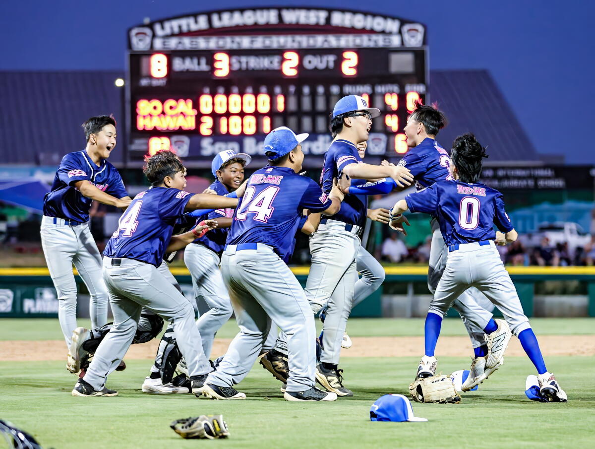 The Little League team from Honolulu celebrates a 4-1 win over Fullerton Golden Hill.