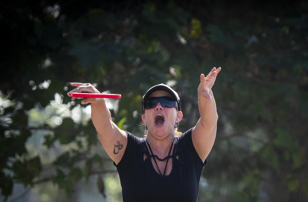 Sue DeLacy scores a winning point at pickleball.