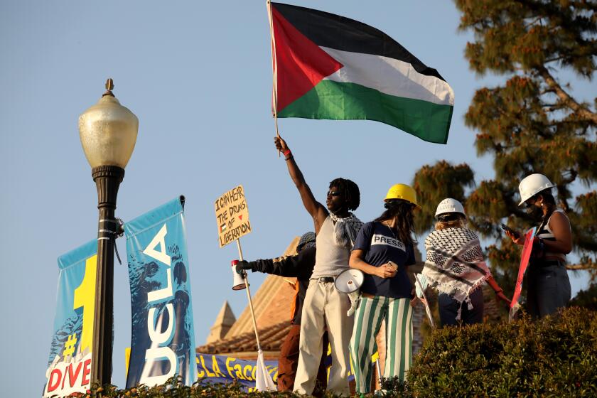 LOS ANGELES, CA - MAY 1, 2024 - Pro-Palestinian protesters rally on Janss Steps on the UCLA campus on May 1, 2024. (Genaro Molina/Los Angeles Times)