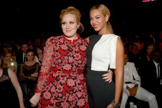  Adele (L) and Beyonce attend the 55th GRAMMY Awards at STAPLES Center on February 10, 2013.