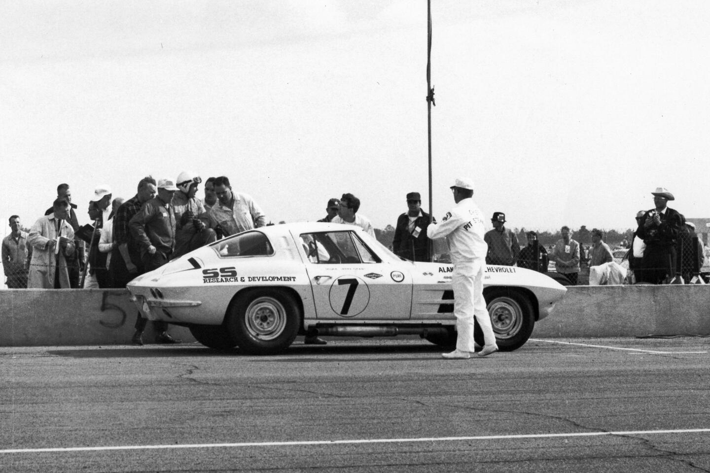A Chevrolet Corvette Sting Ray is in the pits at Daytona International Speedway.