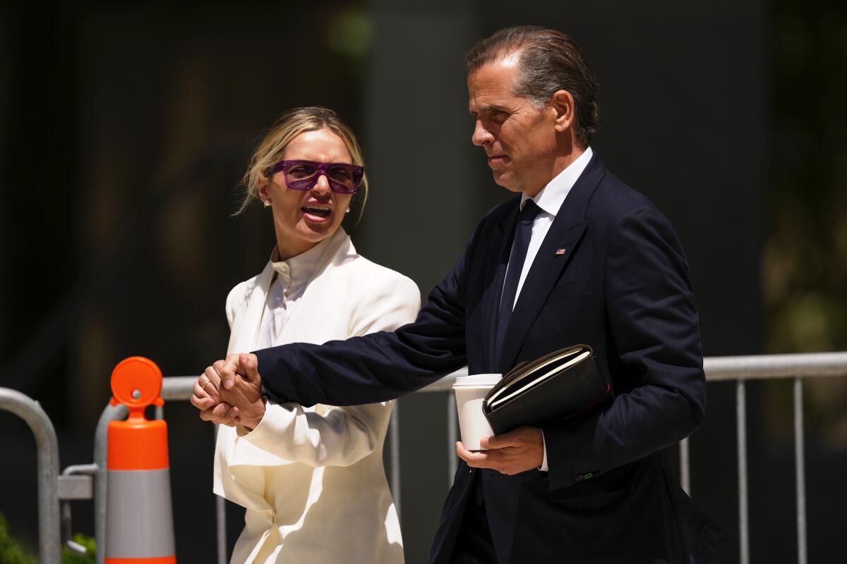 Hunter Biden and Melissa Cohen Biden depart court on Friday, June 7.